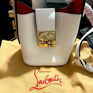 Christian Louboutin
Carasky Leather Studded Shoulder Bag